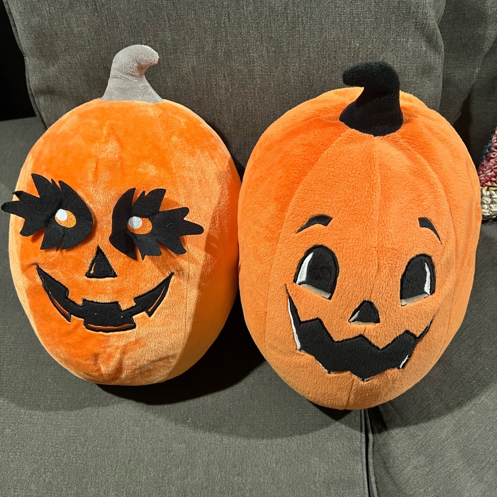 Pumpkin pillows being sold together 13 inches
